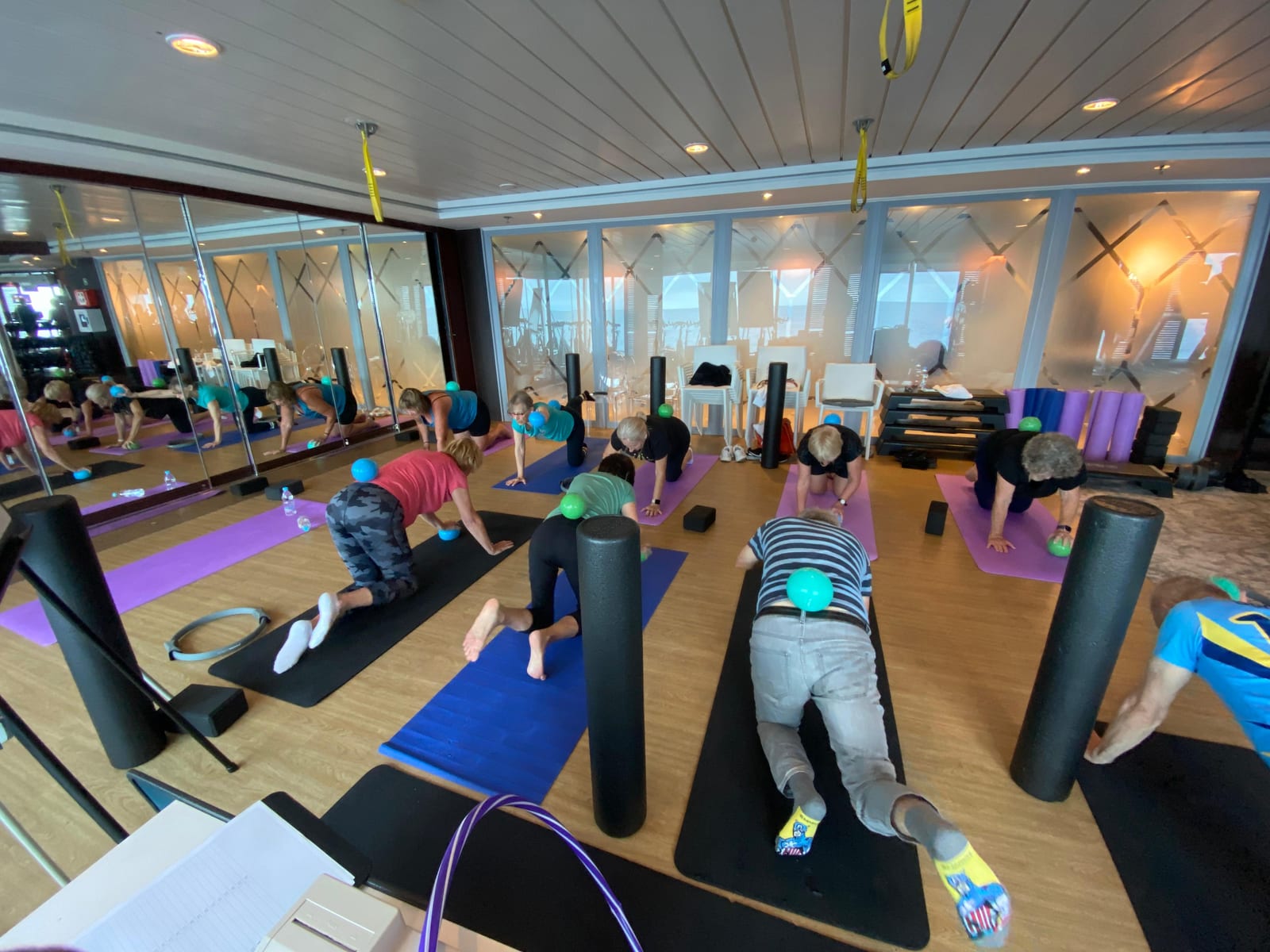 Bassam Mallick — Guiding a deck stretch & mobility session